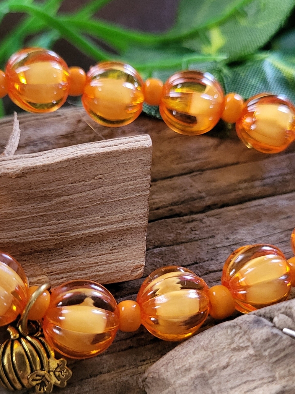 Orange Pumpkin Bead Bracelet With Gold Toned Tiny Pumpkin Charm